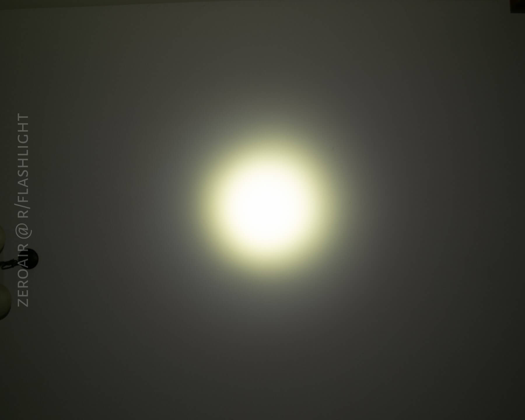 BTU PK26 flashlight beamshots on ceiling