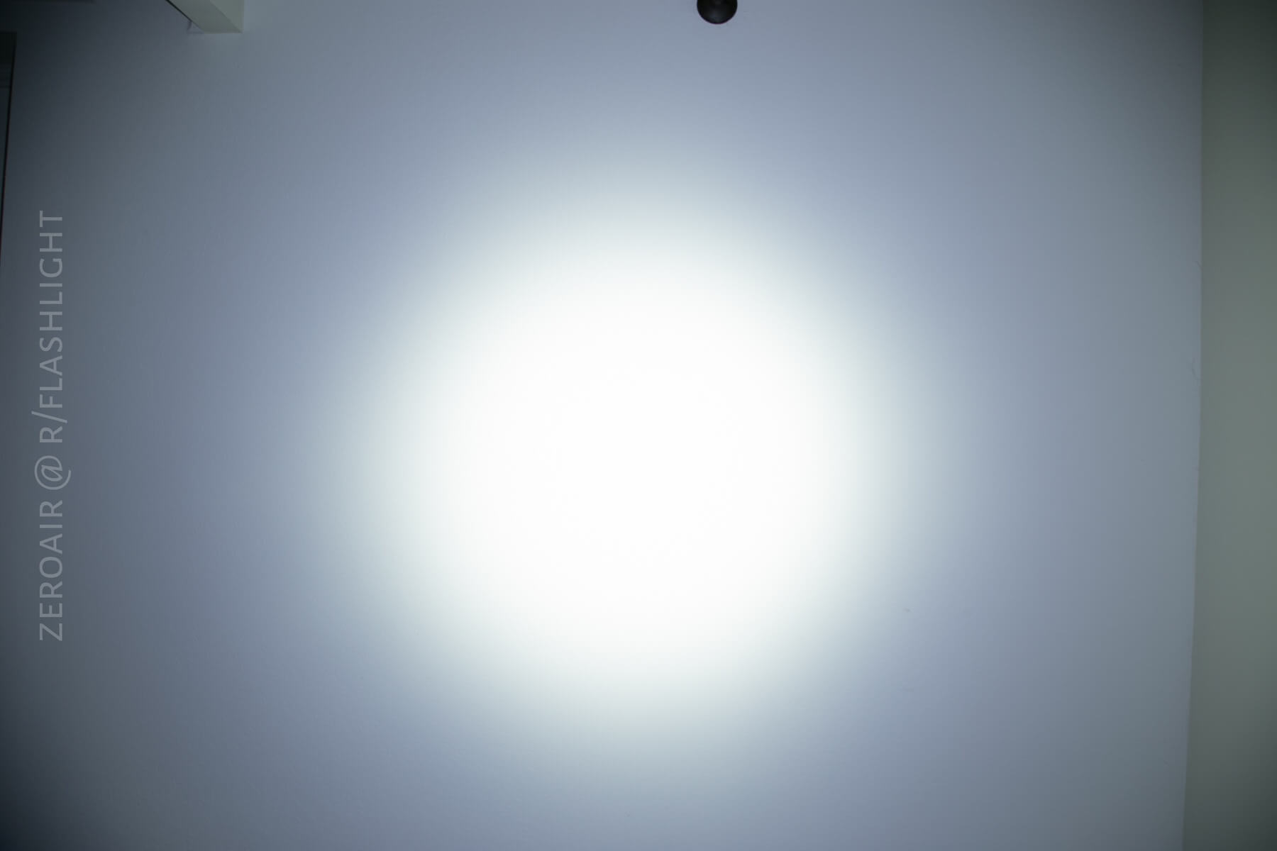 Klarus G20 flashlight beamshots on ceiling