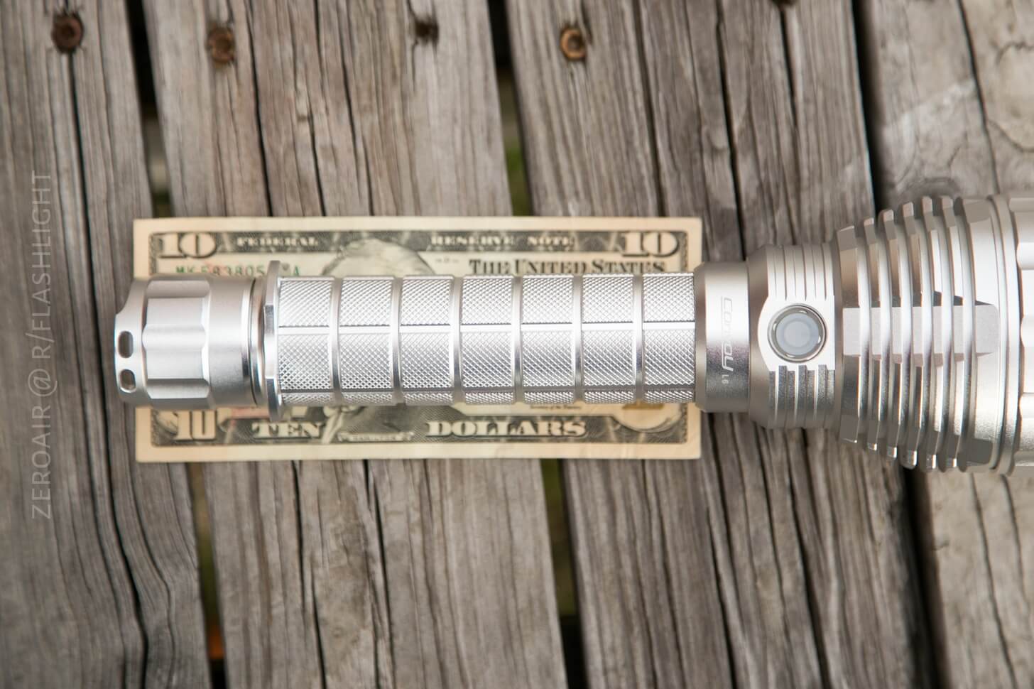 Convoy L6 Clear Flashlight on money bill