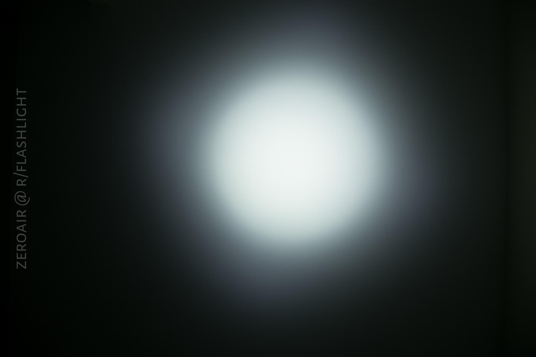 Olight SMini Flashlight beamshots on ceiling