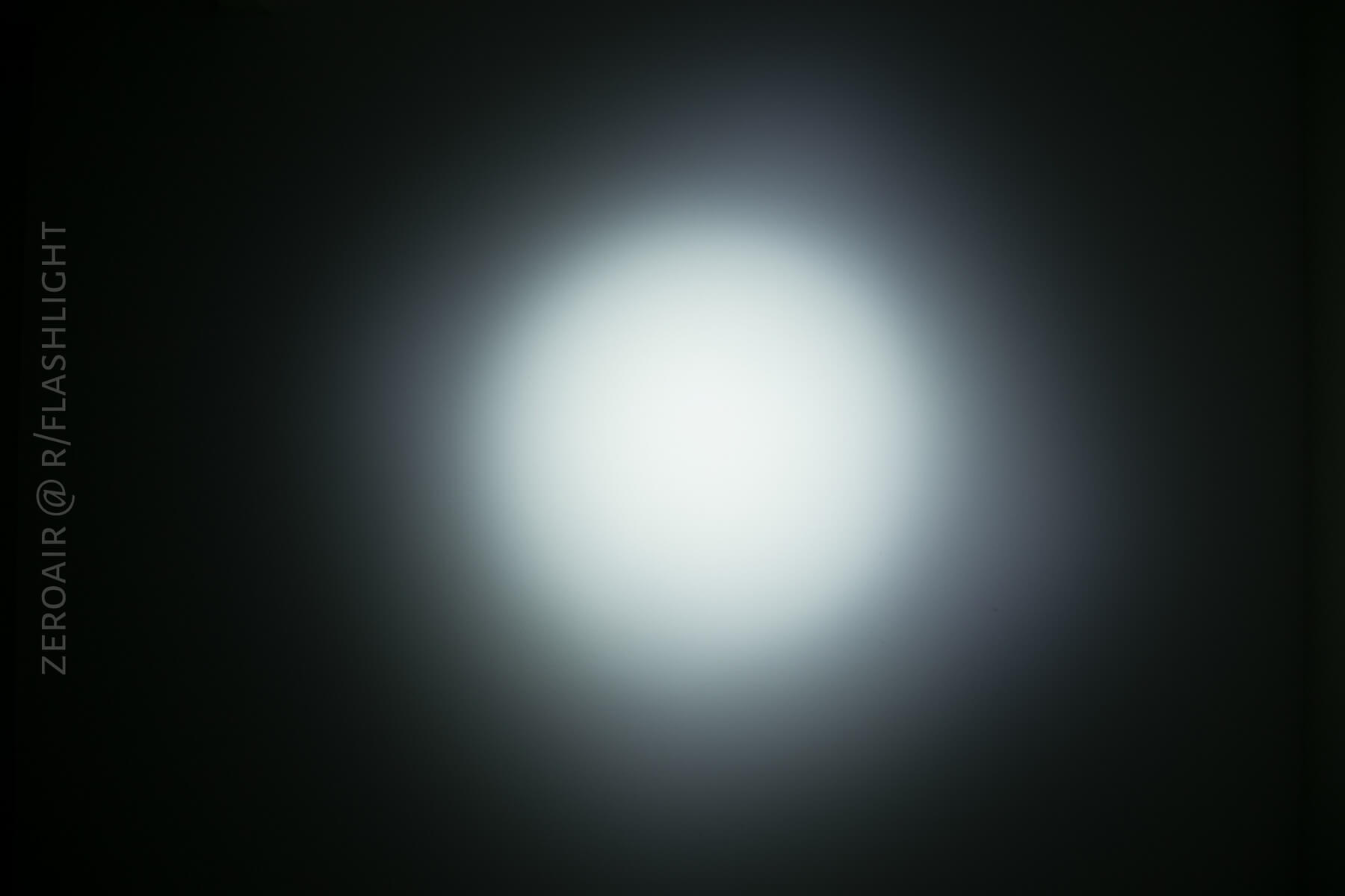 Olight SMini Flashlight beamshots on ceiling