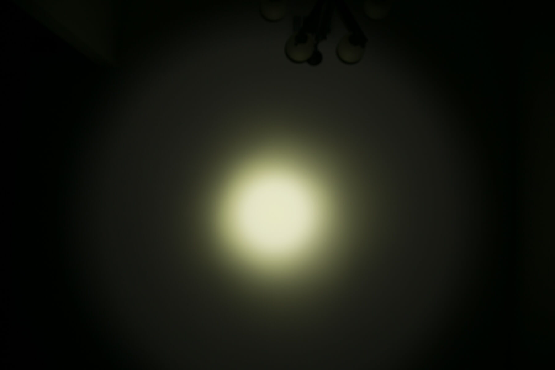 Thrunite TC12 v2 flashlight beamshots on ceiling