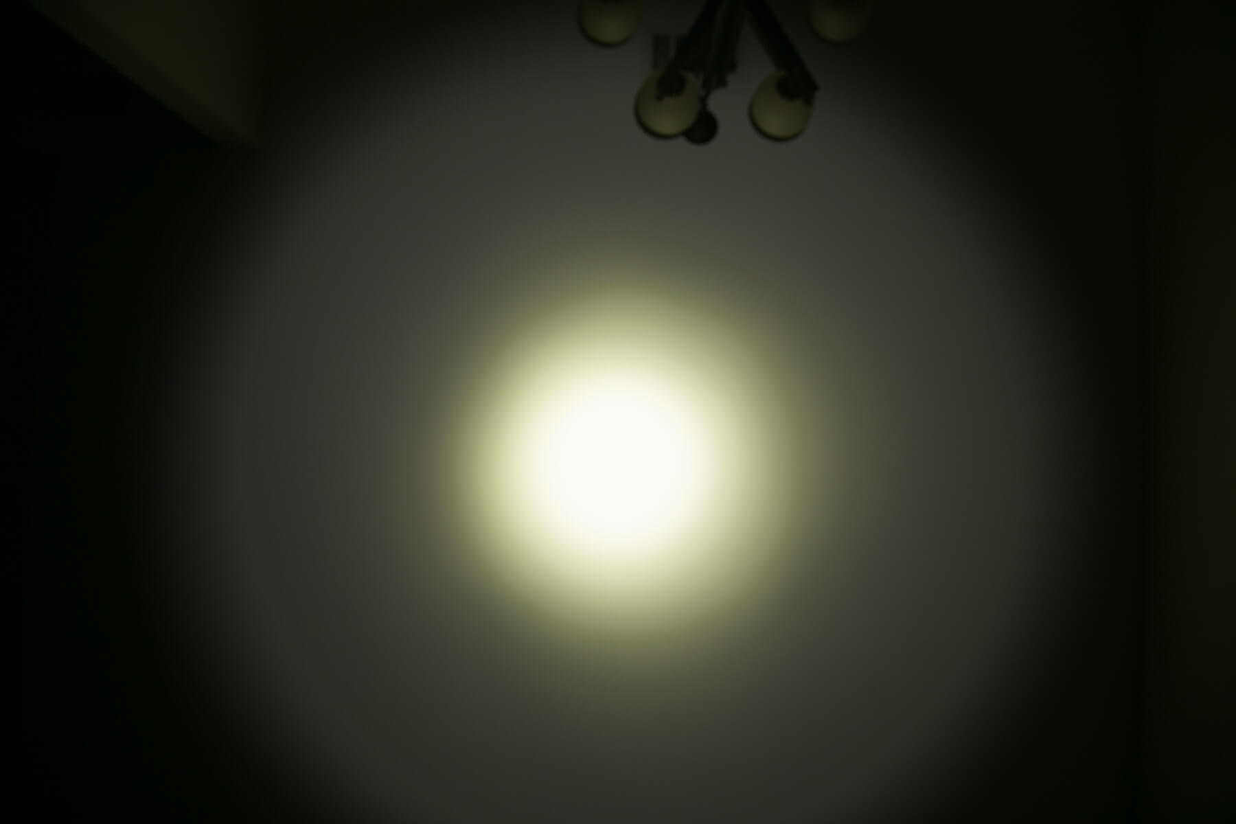 Thrunite TC12 v2 flashlight beamshots on ceiling