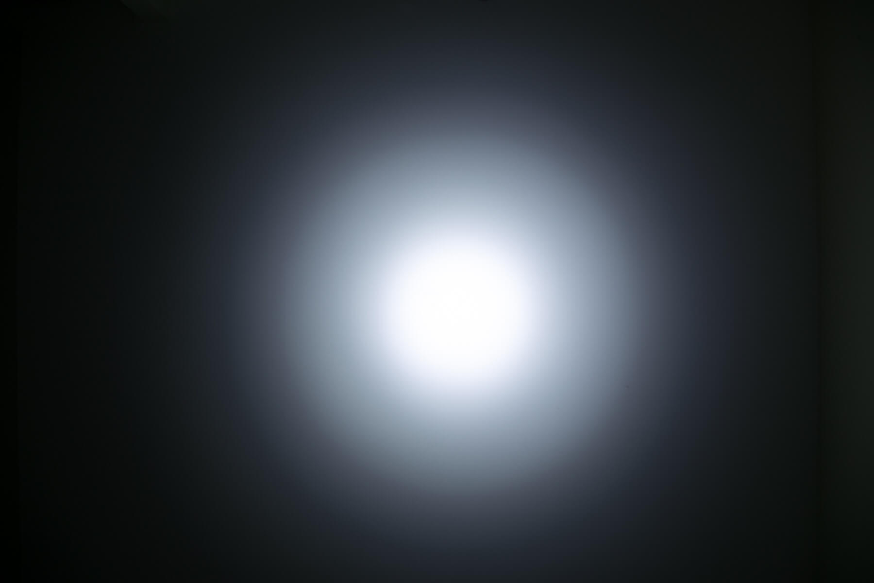 BTU Mini Flashlight beamshots on ceiling