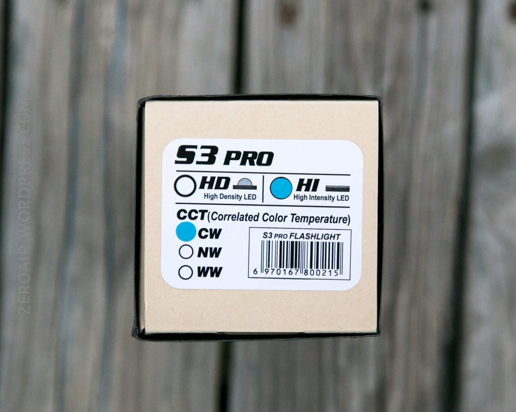 A close-up of a product box showing a label with options for S3 Pro flashlight: HD (High Density LED), HI (High Intensity LED), and color temperatures CW, NW, and WW. A barcode is visible at the bottom right.