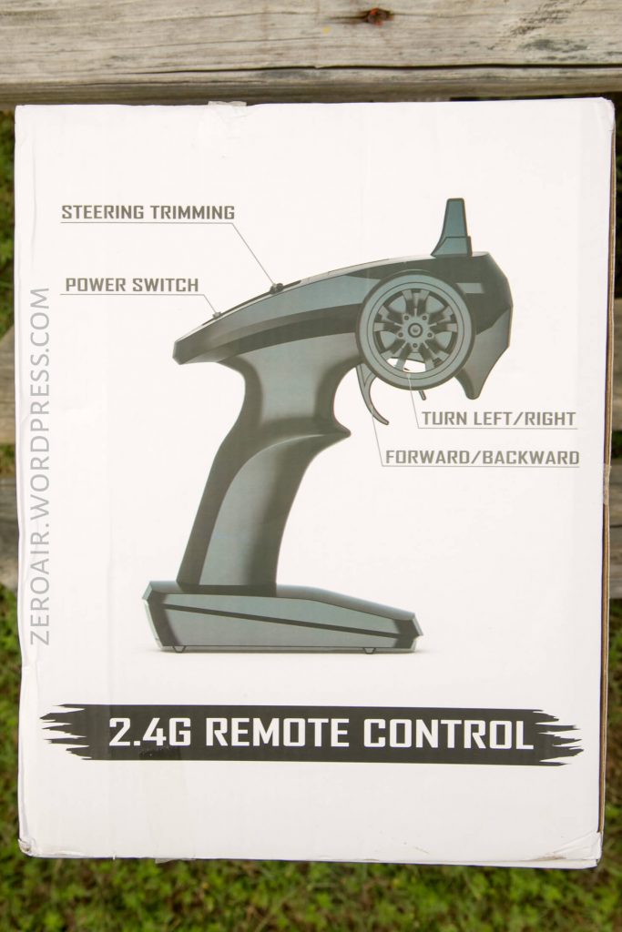 A box displays a black 2.4G remote control with labeled parts: steering trimming, power switch, and controls for turning left/right and moving forward/backward. The background is white with text and a website URL.