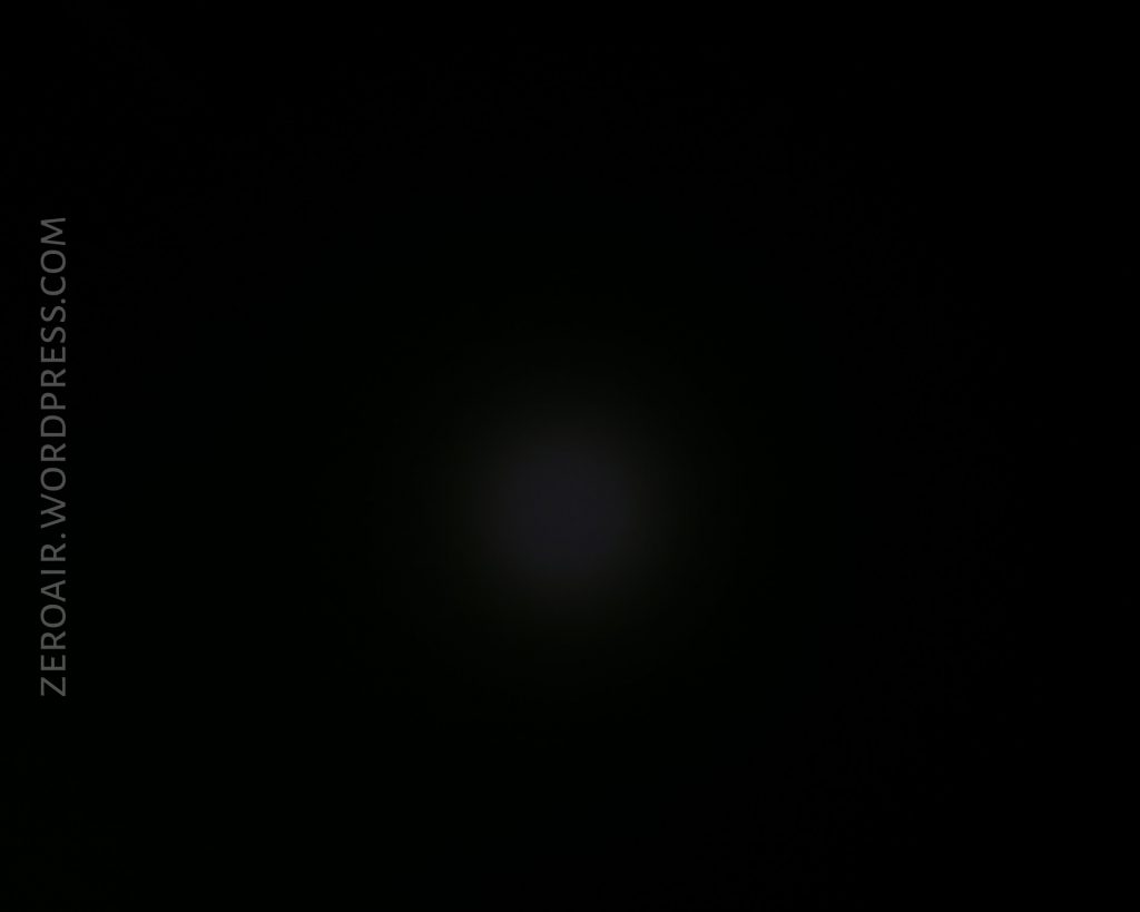 A mostly black image with a faint, dim light in the center. Along the left side, the text ZEROAIR.WORDPRESS.COM is vertically displayed.