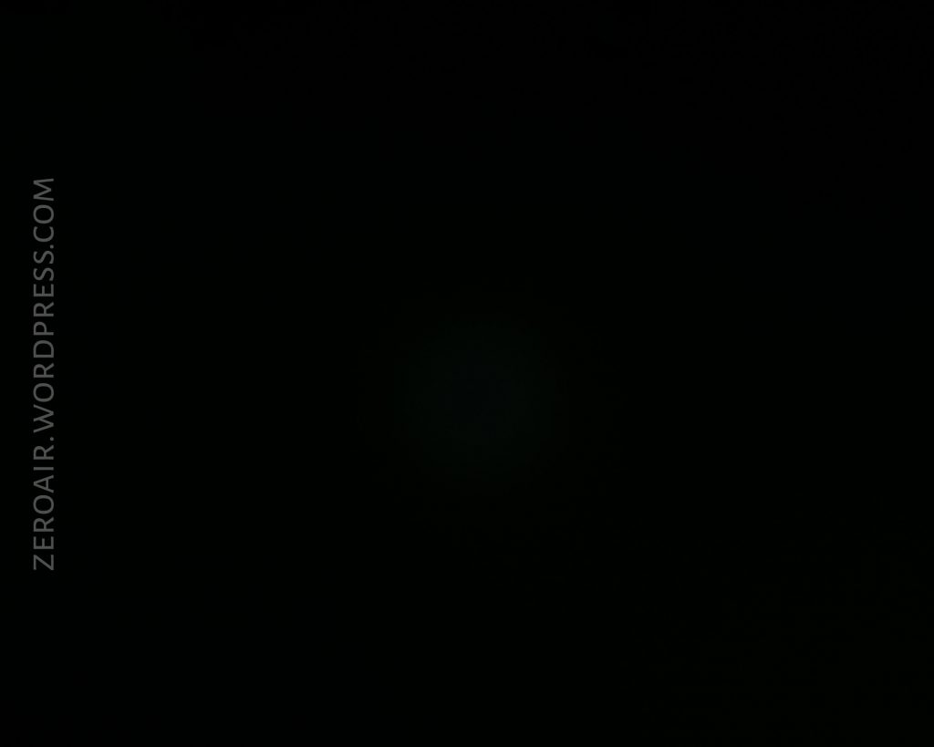 A mostly black image with very little visible detail. The text ZEROAIR.WORDPRESS.COM appears vertically along the left side.