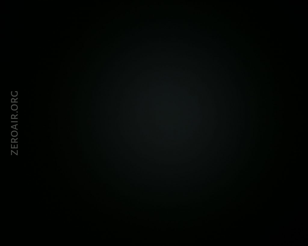 A completely dark black image with the faint text ZEROAIR.ORG vertically aligned on the left side. No other visible features or objects are present.