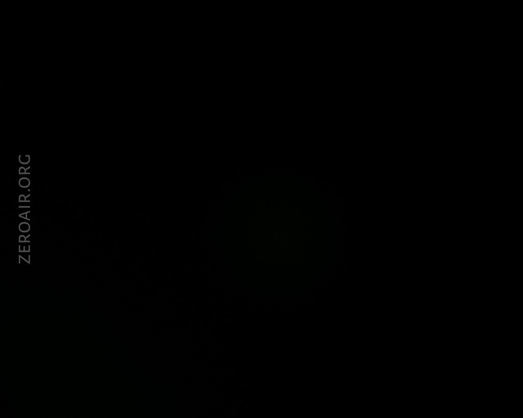 A completely dark image with no visible objects or details. The text ZEROAIR.ORG appears vertically on the left side.