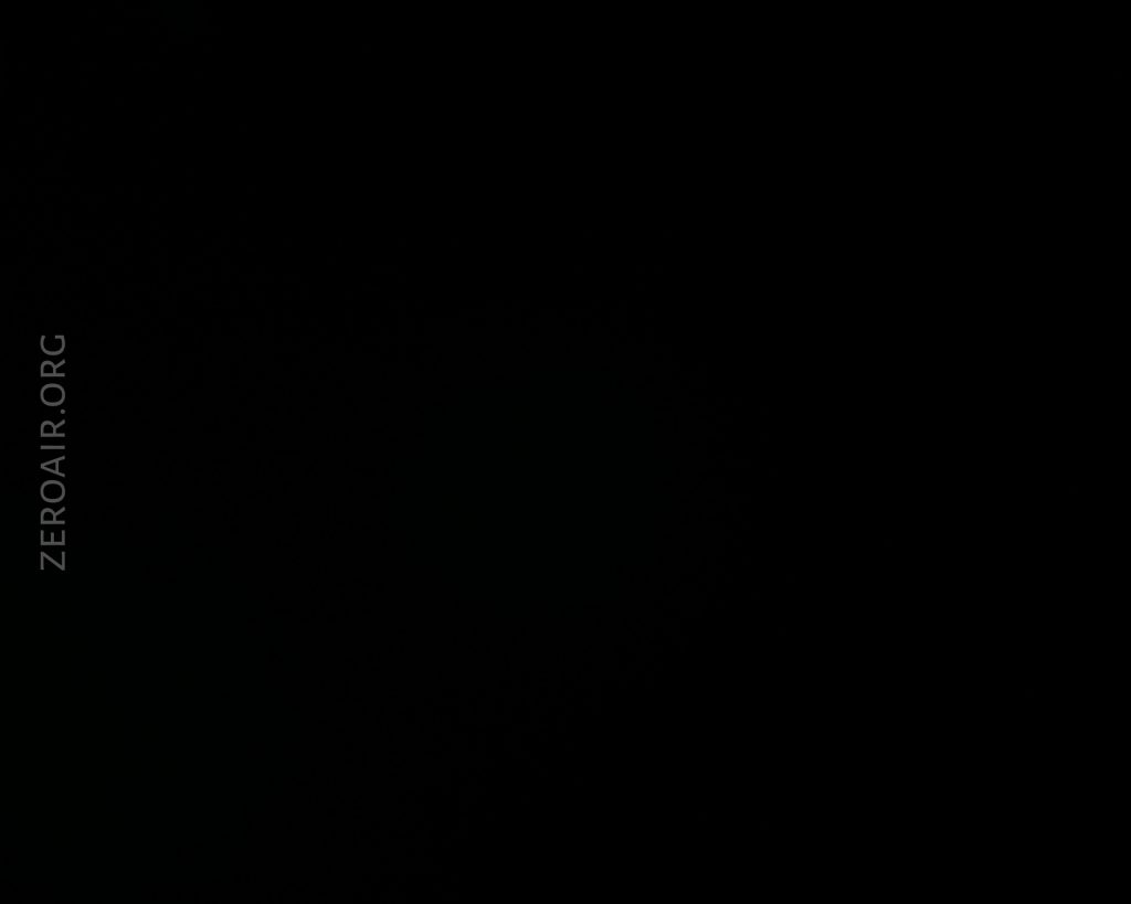 A completely black image with the text ZEROAIR.ORG vertically aligned on the left side. There are no discernible objects or features visible.