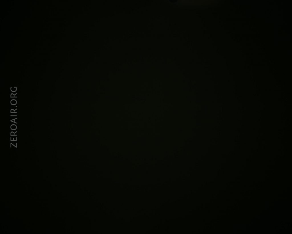 A nearly black image with very low visibility; only the faint text ZEROAIR.ORG is visible on the left side of the image.