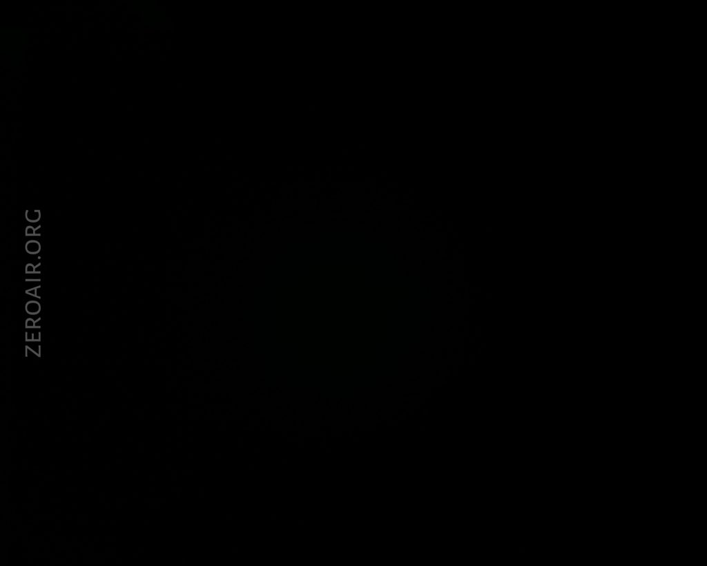 A completely dark image with a black background. The only visible detail is the text ZEROAIR.ORG in thin, vertical letters on the left side of the image.