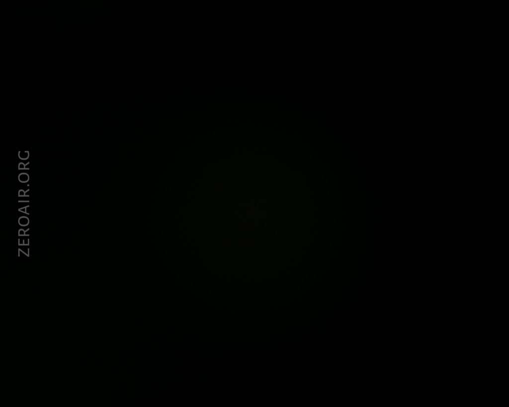 A mostly black image with the text ZEROAIR.ORG vertically aligned on the left side. The rest of the image appears dark, with no distinguishable objects or features visible.