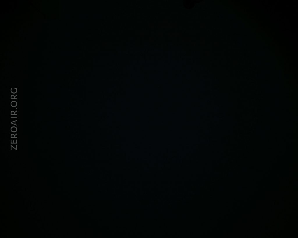 A nearly black image with the text ZEROAIR.ORG in vertical white letters on the left side. No other visible objects or details can be discerned.