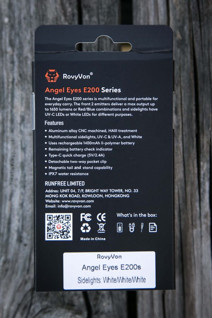 The back of a RovyVon Angel Eyes E200 Series flashlight box, listing features such as multi-LED output, rechargeable battery, and waterproof rating, with technical specifications and company contact information.