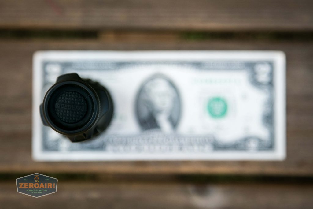 acebeam l17 osram white 18650 thrower on two dollar bill