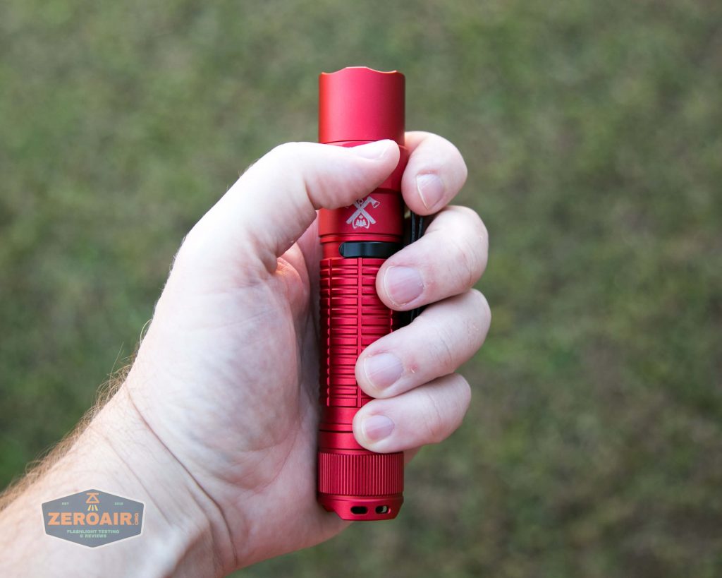 thrunite tt20 the outsider red 21700 flashlight in hand