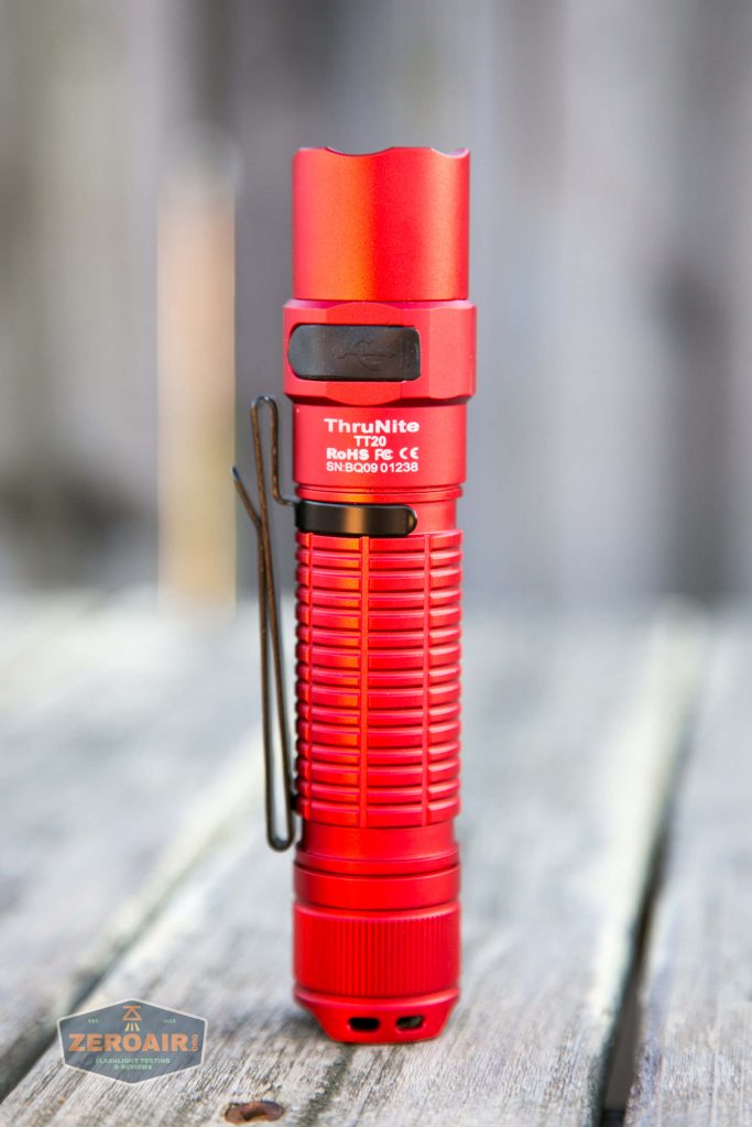 thrunite tt20 the outsider red 21700 flashlight standing