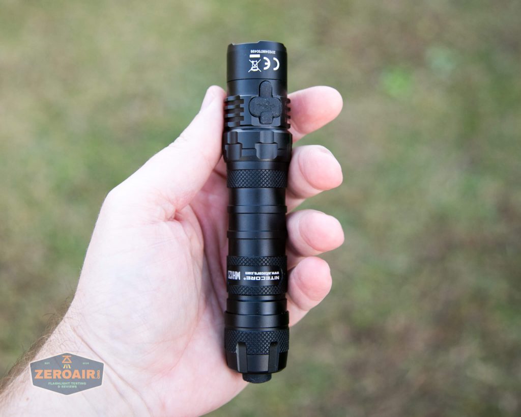nitecore mh12s tactical flashlight in hand