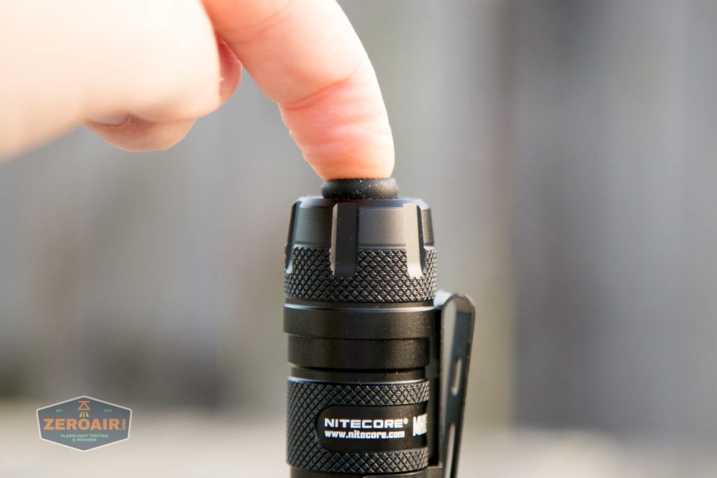 nitecore mh12s tactical flashlight tail switch depressed