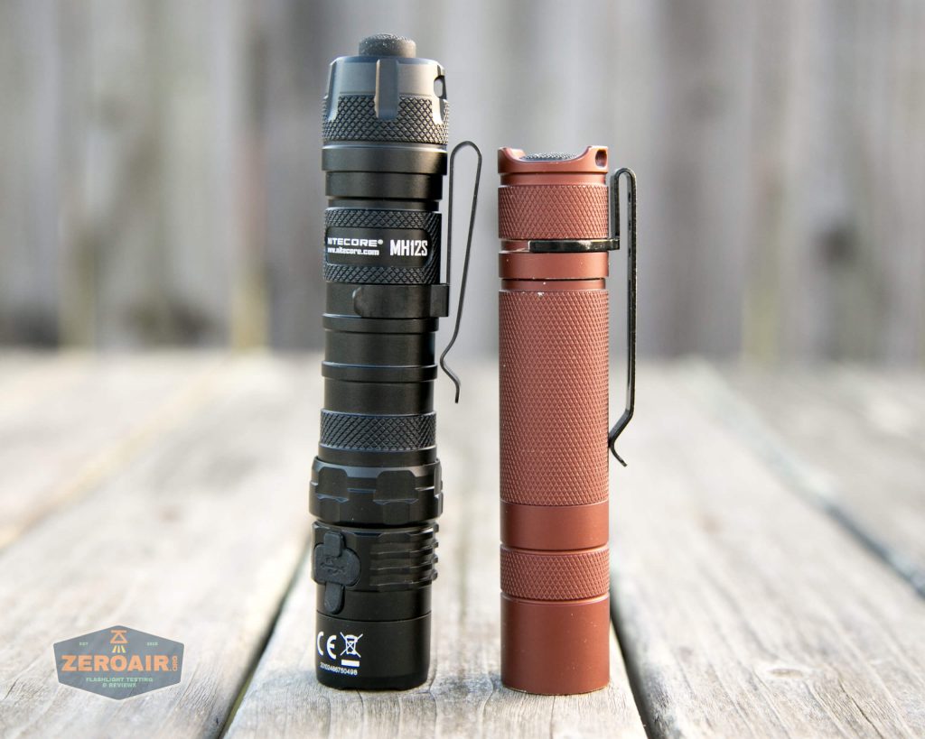 nitecore mh12s tactical flashlight beside convoy s2+