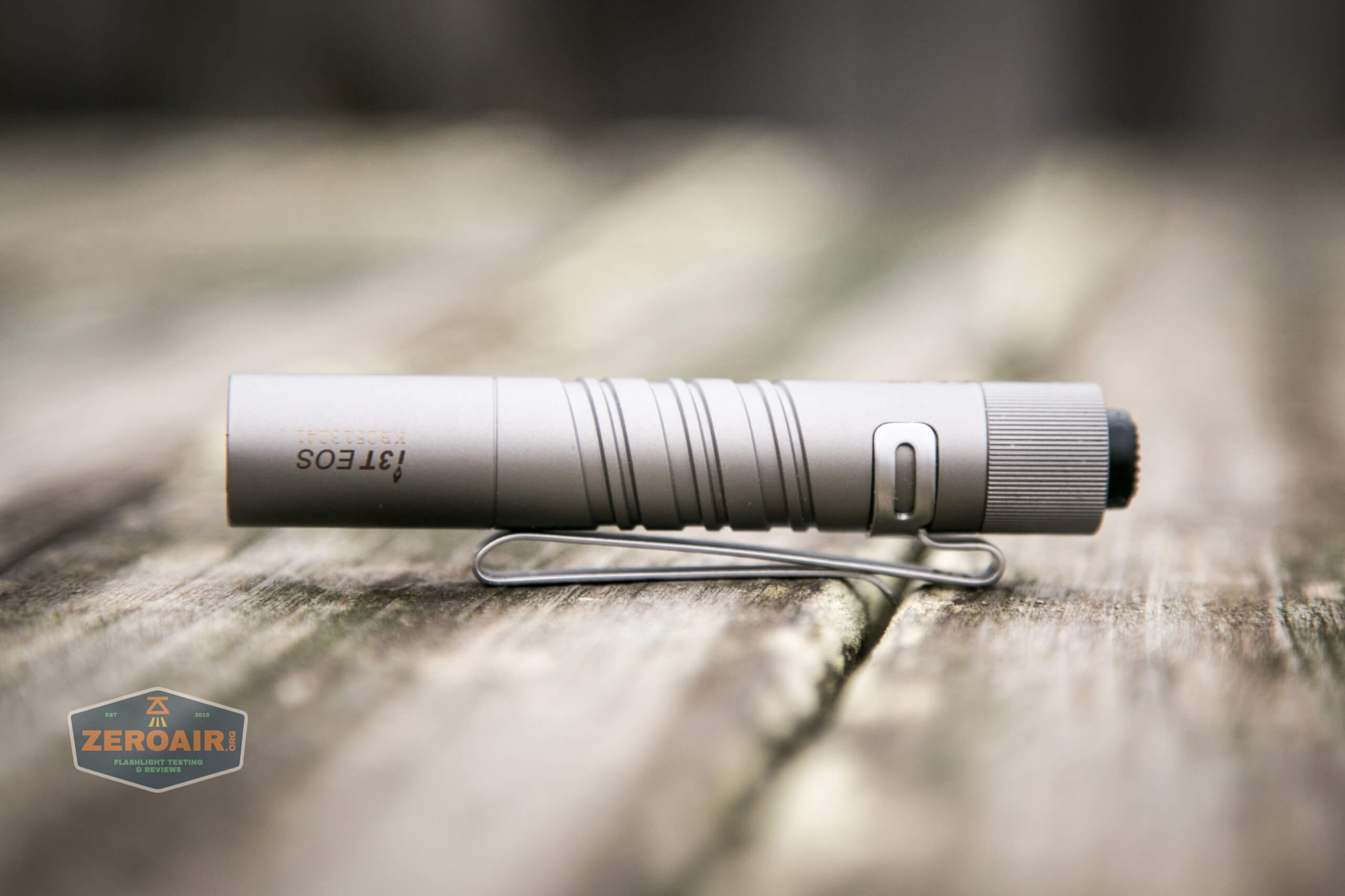 olight i3t eos titanium aaa flashlight upside down logo