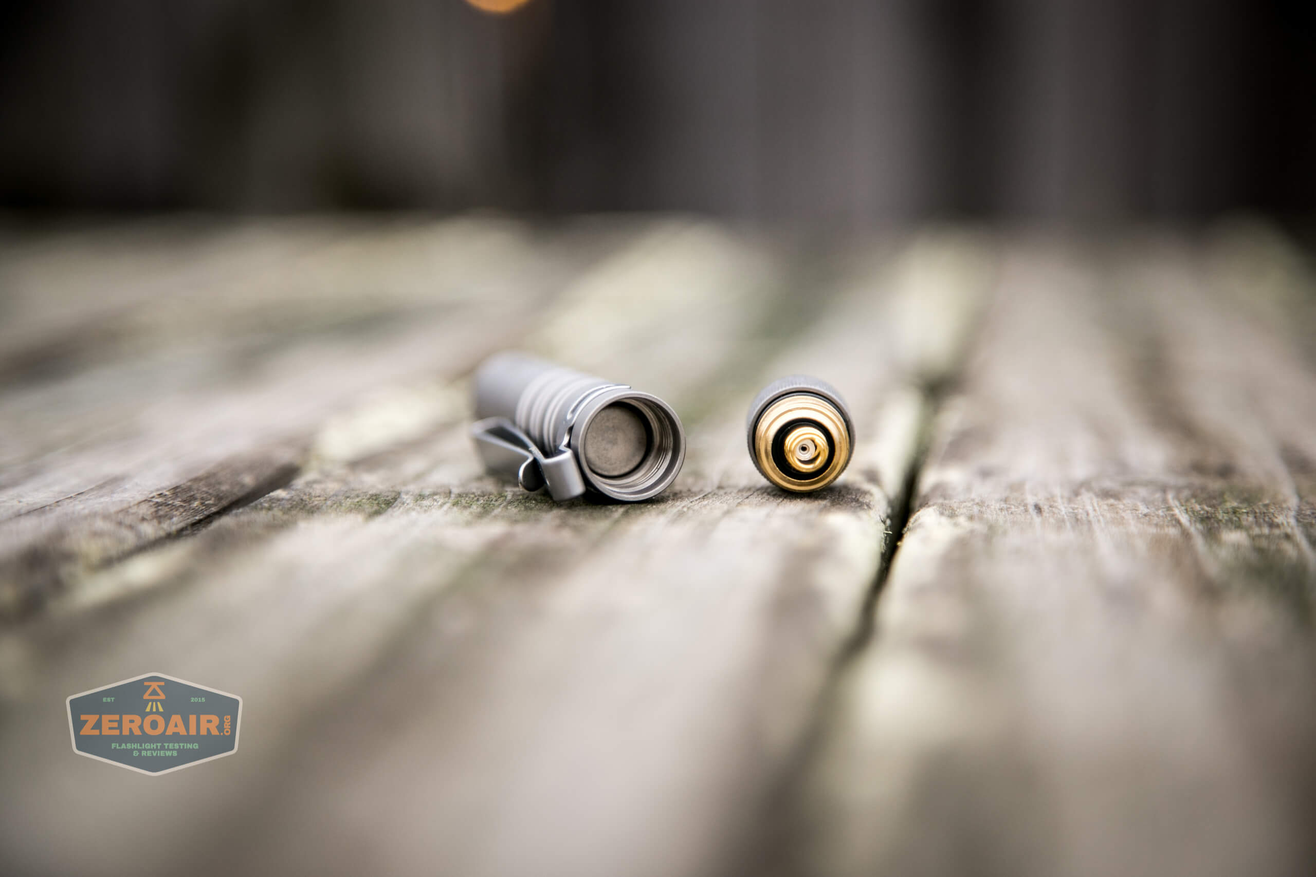 olight i3t eos titanium aaa flashlight cell installed