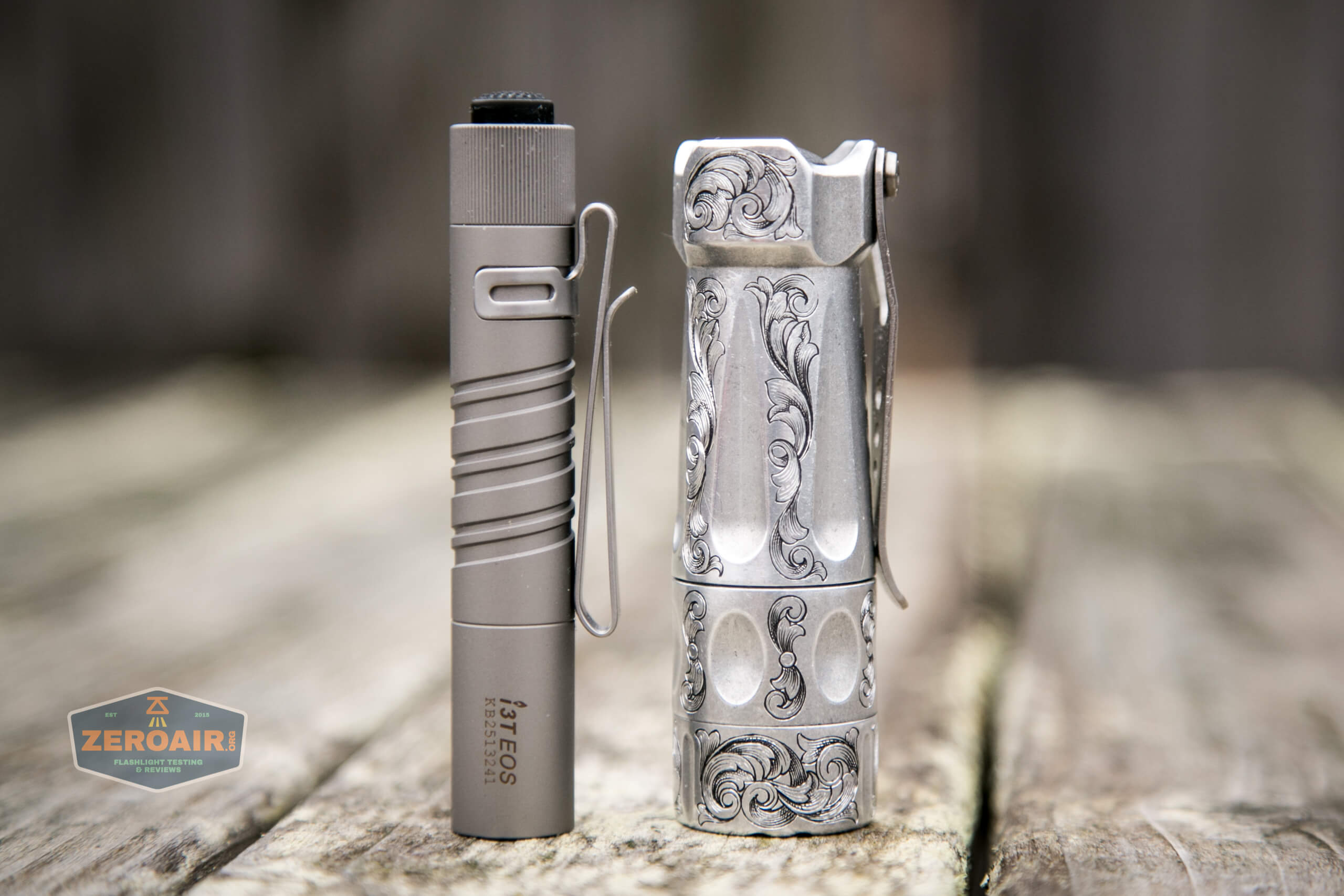 olight i3t eos titanium aaa flashlight beside torchlab boss 35