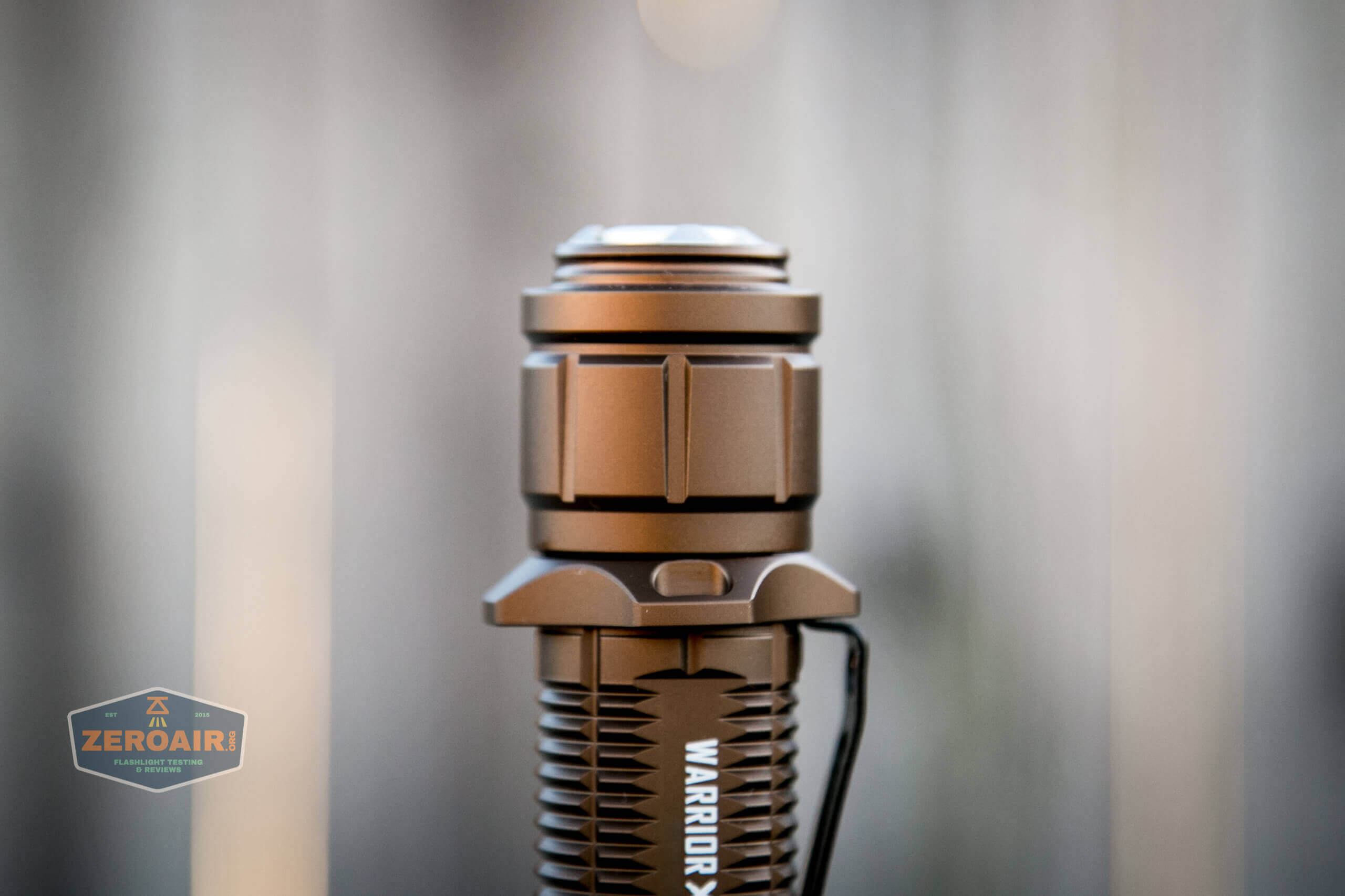 olight warrior x turbo desert tan flashlight tailcap profile