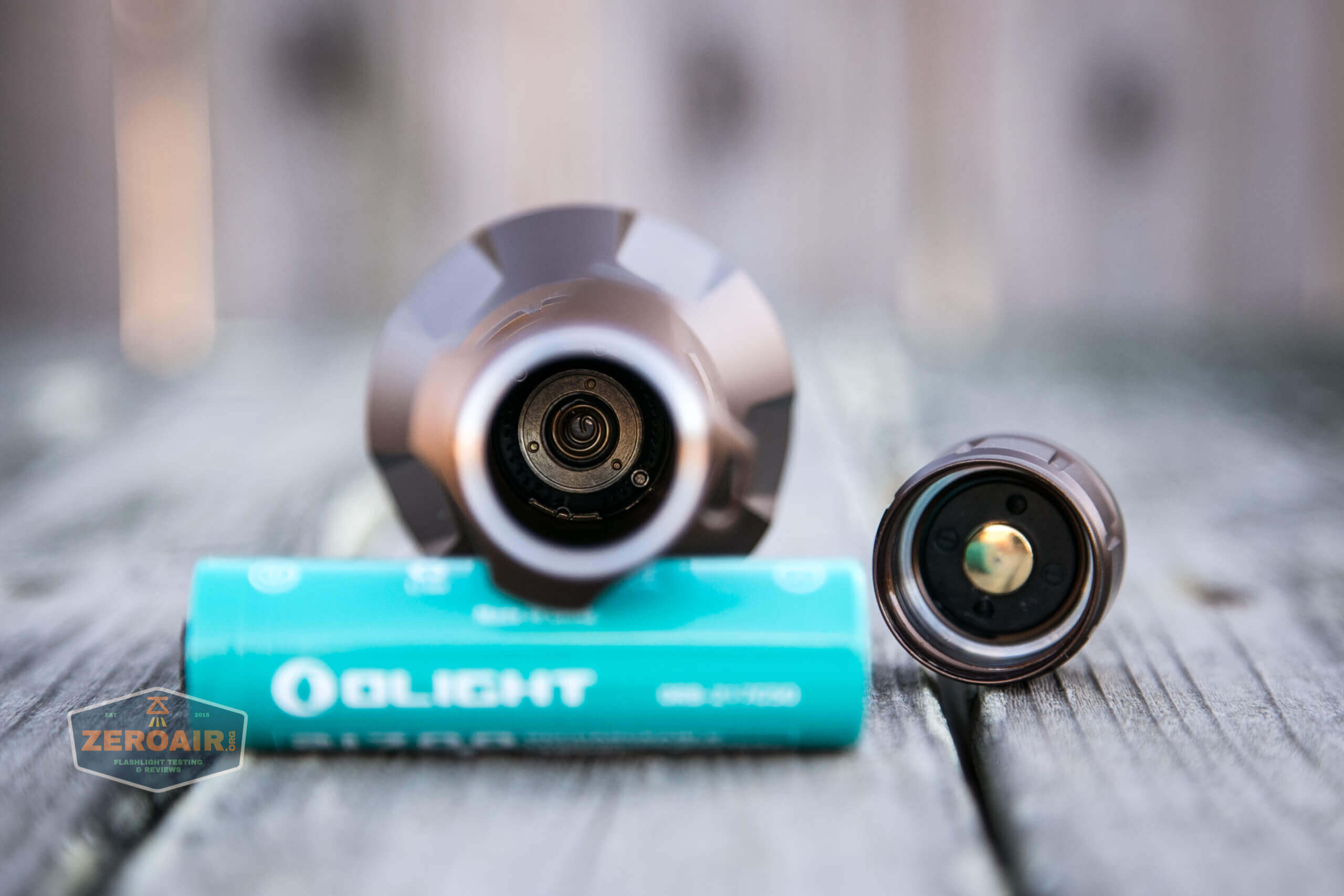 olight warrior x turbo desert tan flashlight head contacts