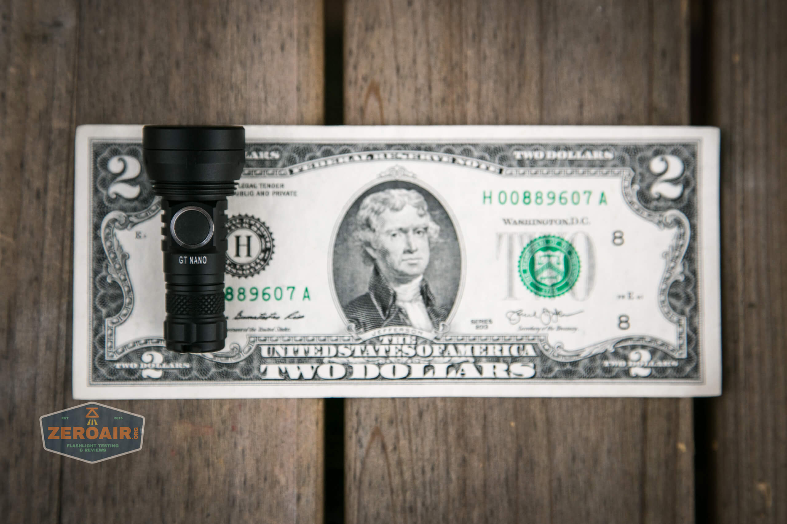 lumintop gt nano osram 10180 thrower on two dollar bill