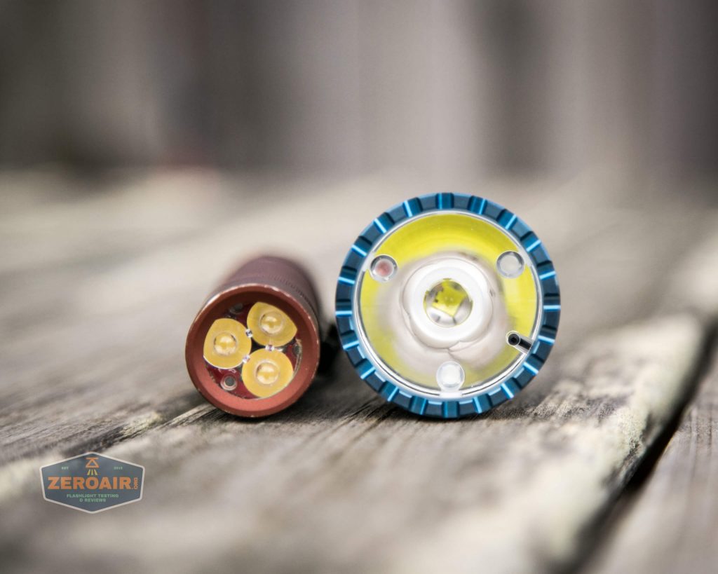 olight freyr rgb flashlight beside convoy s2+