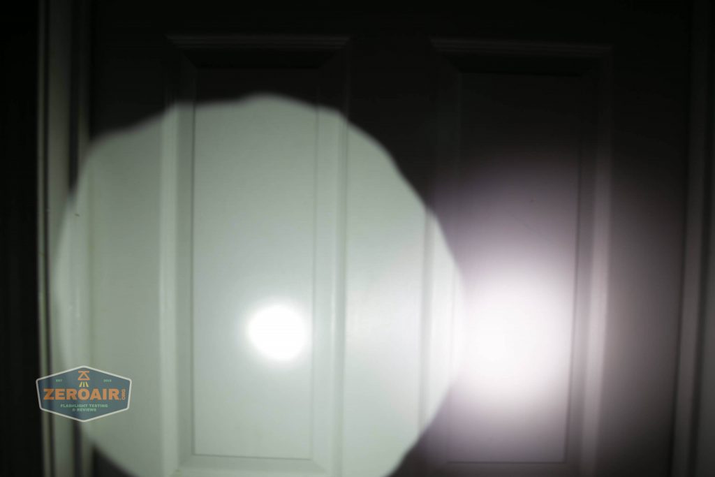 olight warrior x turbo desert tan flashlight beamshot door low