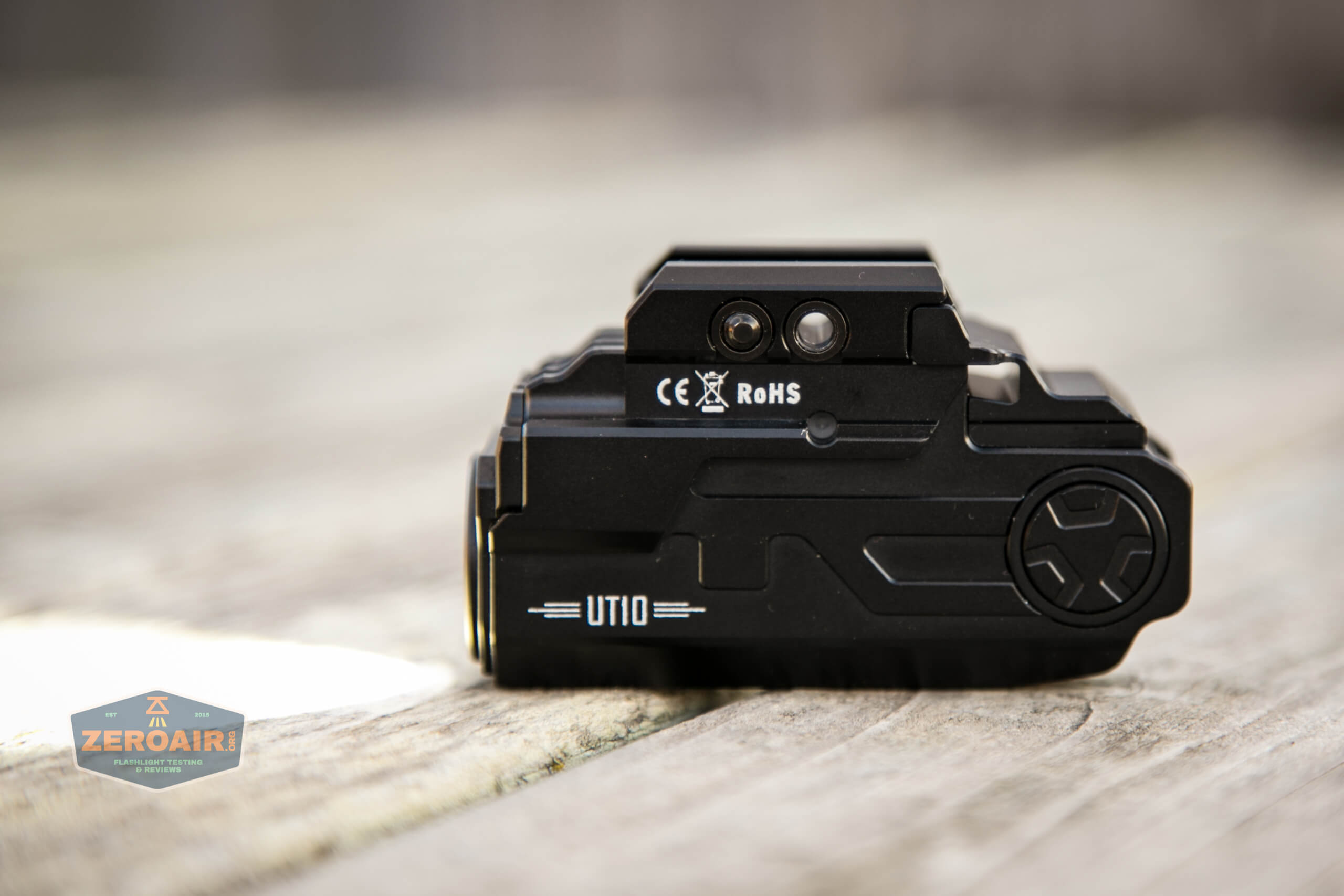 imalent ut10 tactical weapon flashlight on