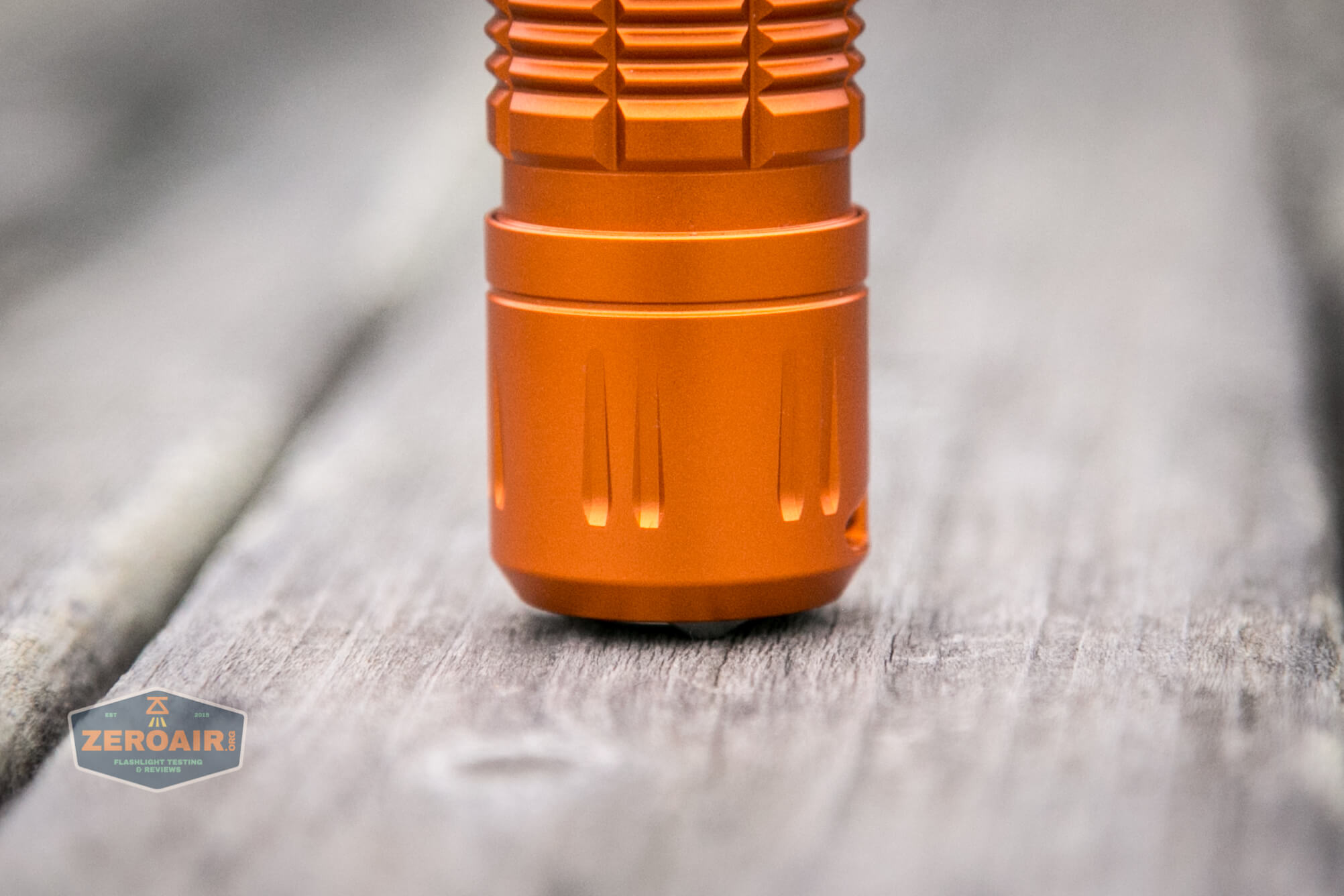 Olight M2R Pro Warrior Orange tailstanding