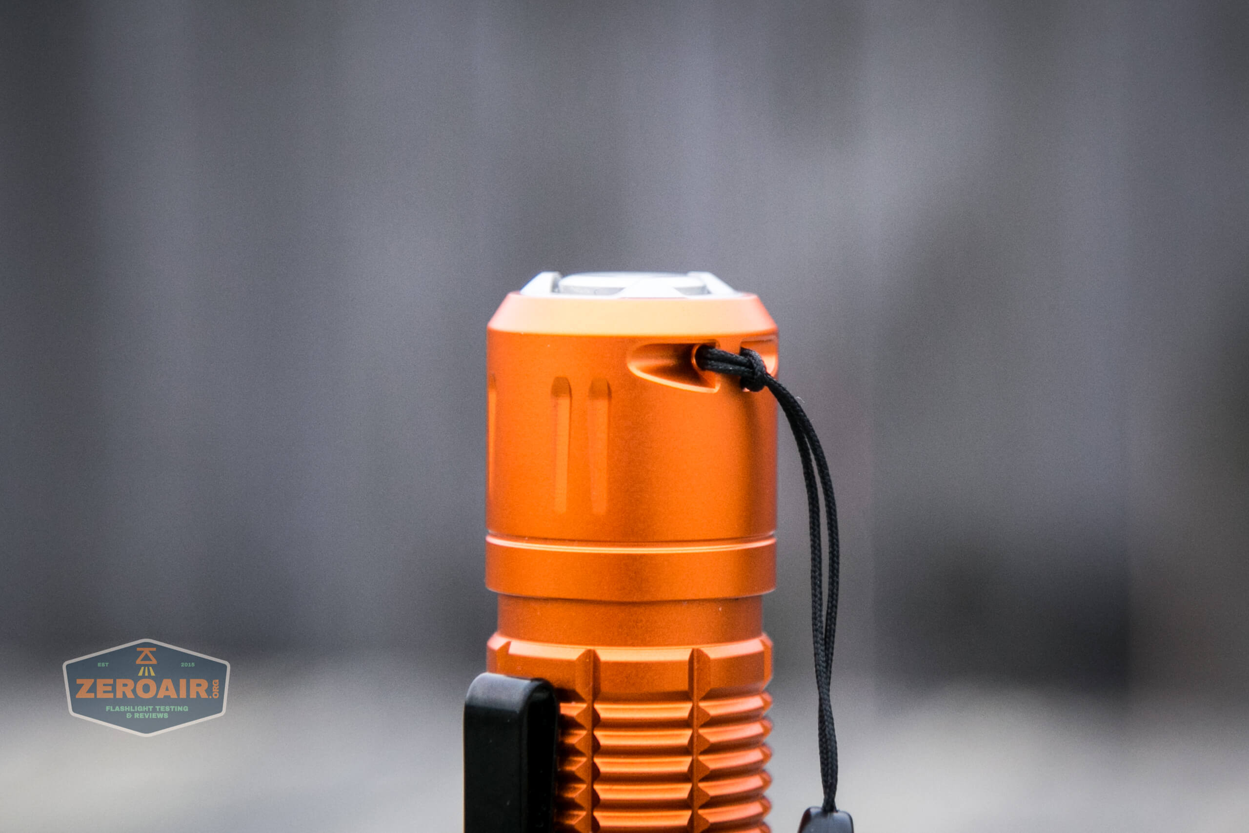 Olight M2R Pro Warrior Orange lanyard installed