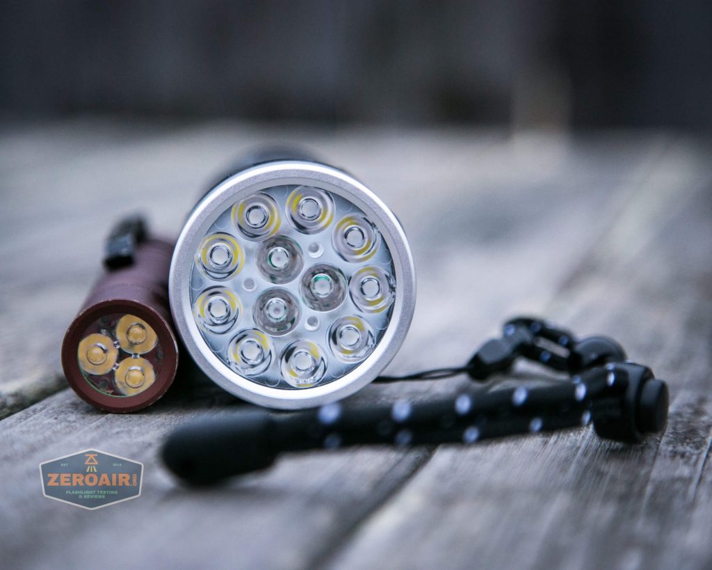 nitebeam x12uv flashlight beside convoy s2+