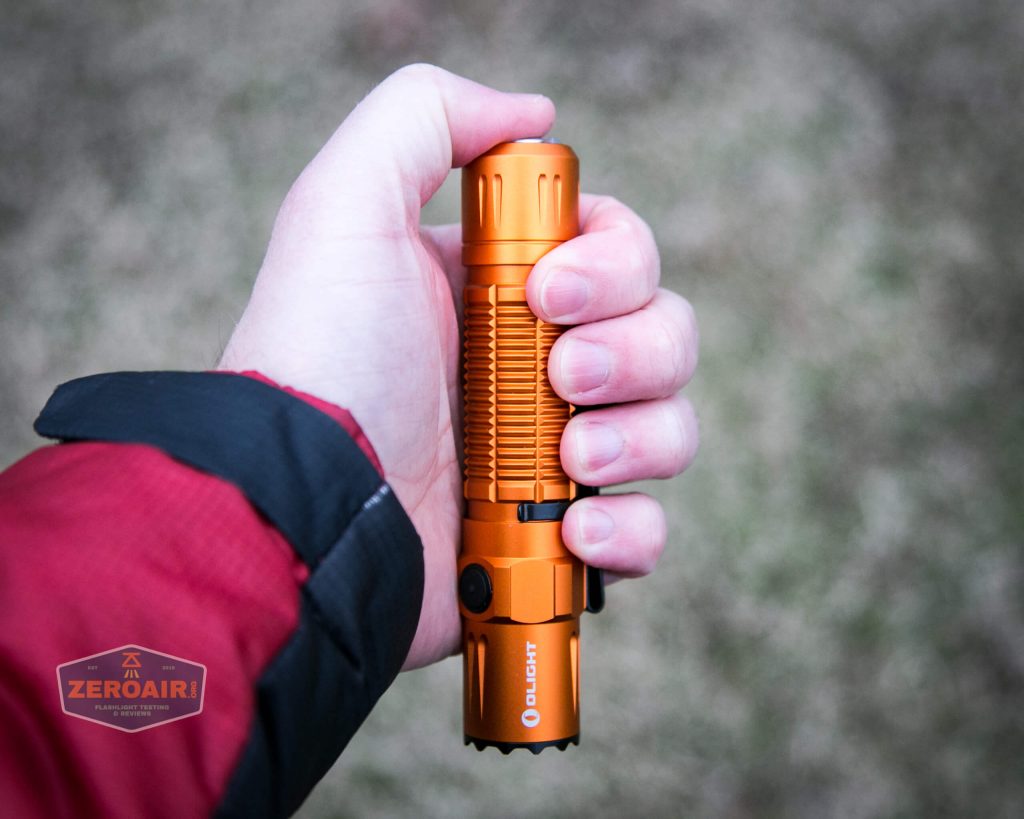 Olight M2R Pro Warrior Orange in hand