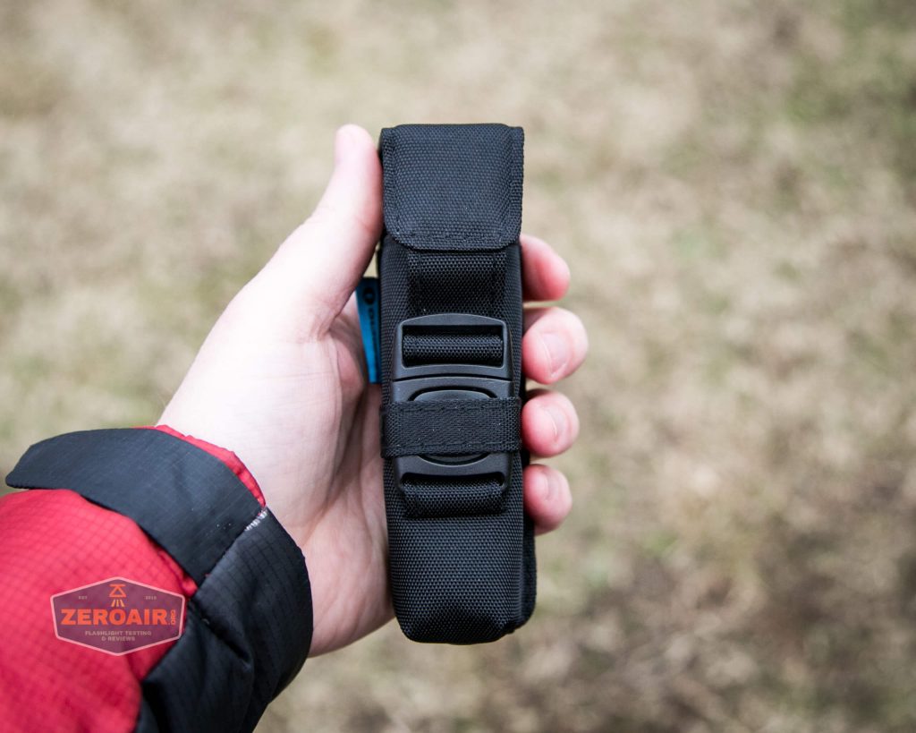 Olight M2R Pro Warrior Orange nylon pouch in hand
