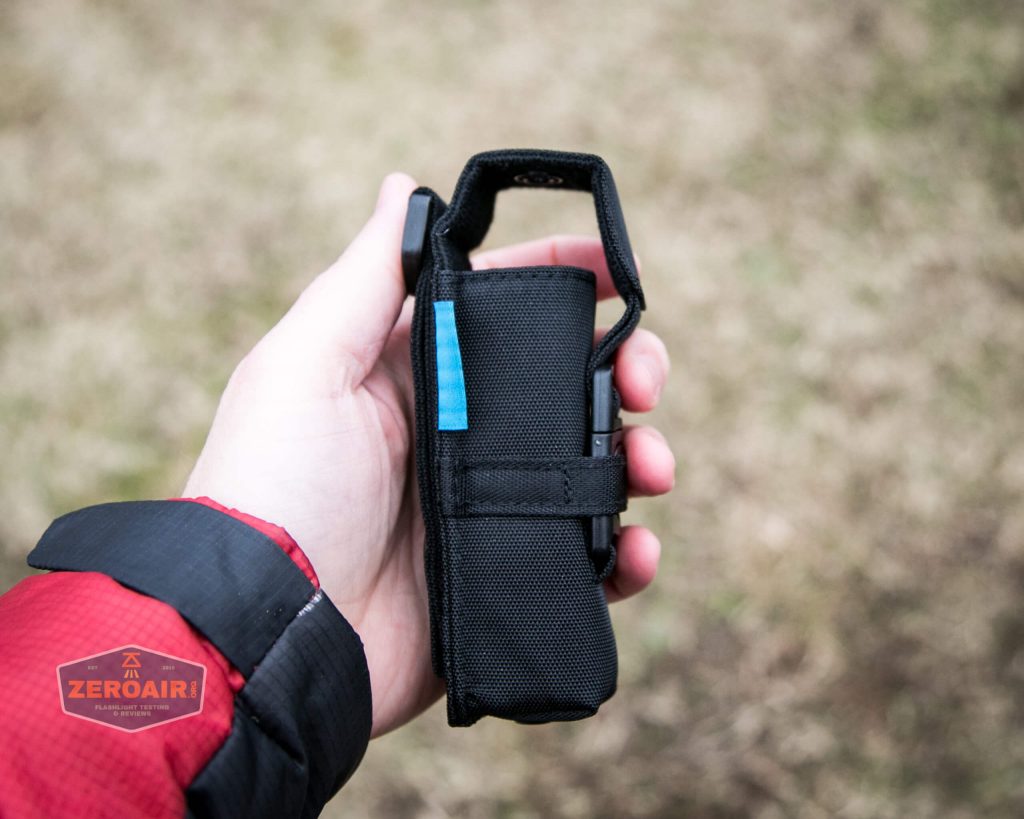 Olight M2R Pro Warrior Orange nylon pouch in hand