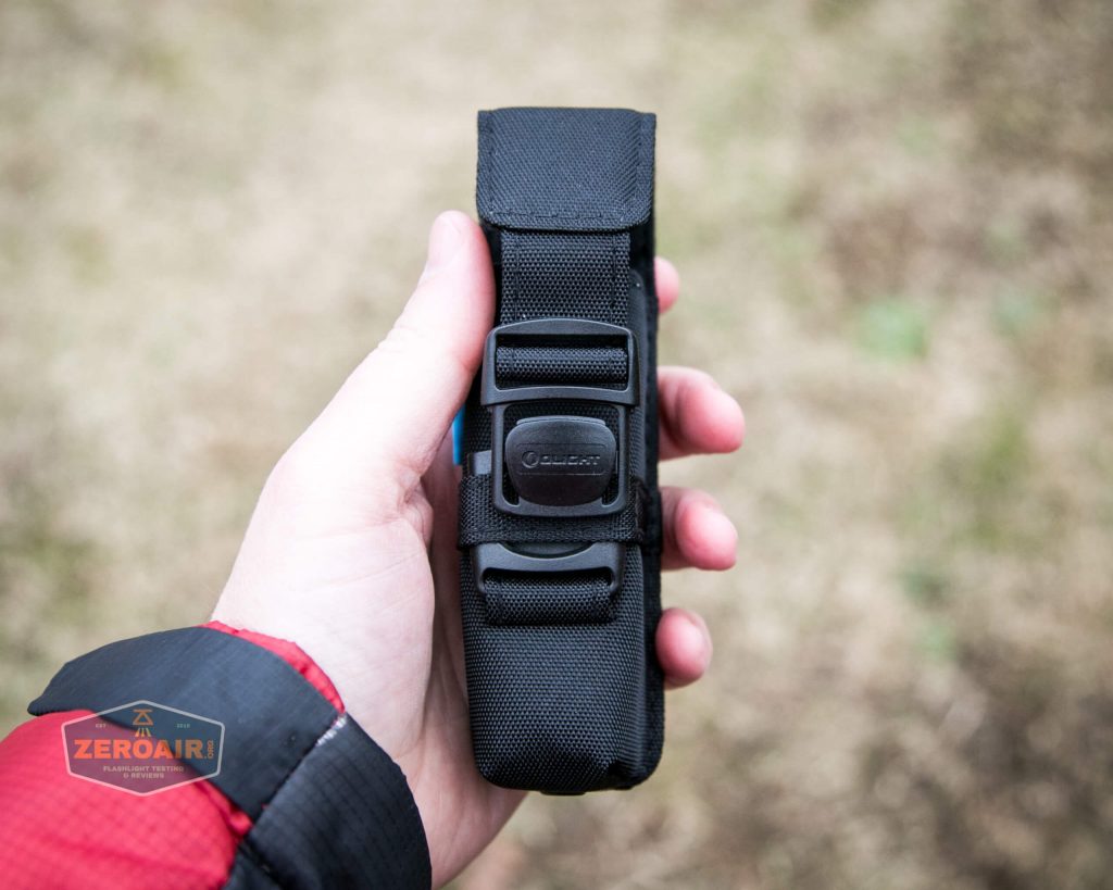 Olight M2R Pro Warrior Orange nylon pouch in hand