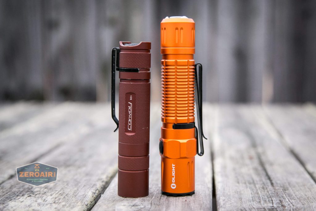 Olight M2R Pro Warrior Orange beside convoy s2+
