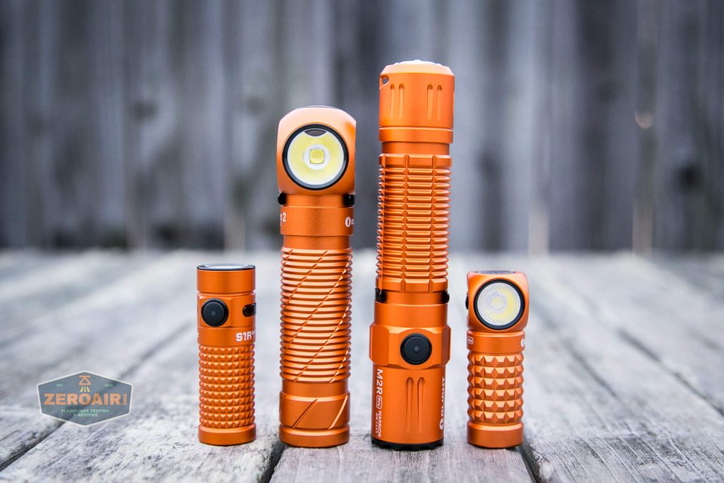 Olight M2R Pro Warrior Orange with other orange olights