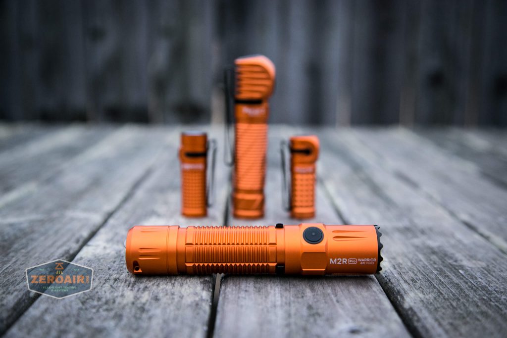 Olight M2R Pro Warrior Orange with other orange olights