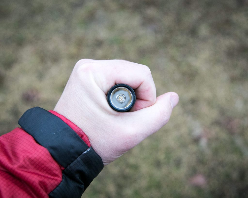 sofirn sp31uv ultraviolet 18650 flashlight in hand