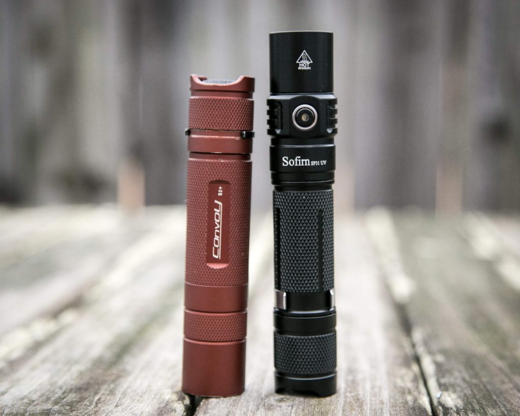sofirn sp31uv ultraviolet 18650 flashlight beside convoy s2+