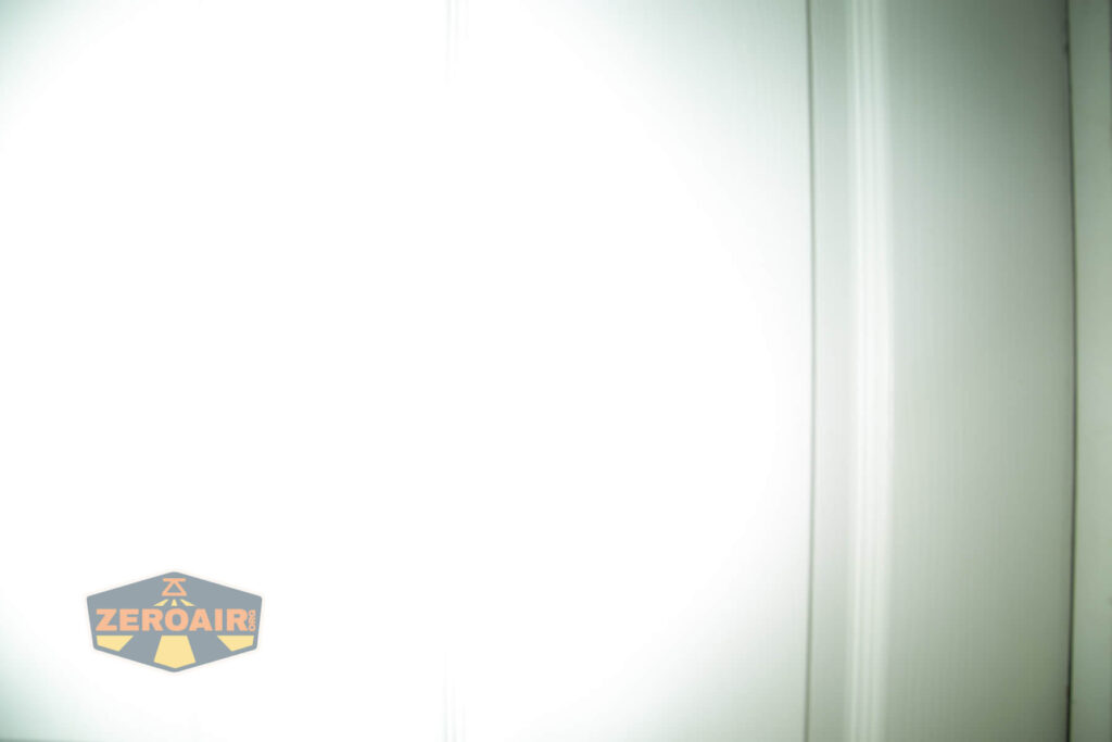 beam photo against door, compared to nichia 219b