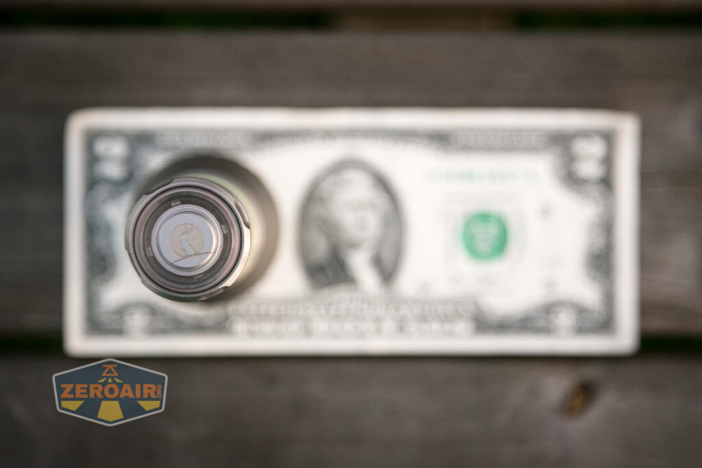 Lumintop LEP 18350 on two-dollar bill;