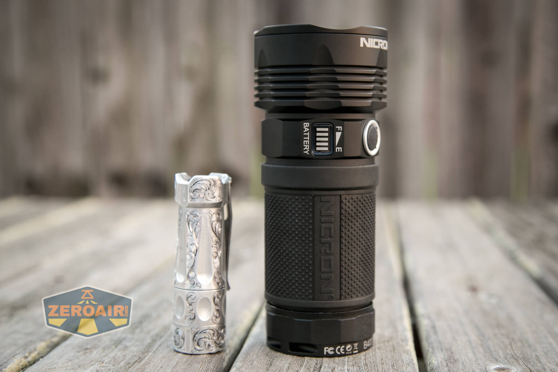 Nicron B400 Flashlight beside torchlab boss 35